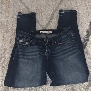 Dark wash buckle jeans